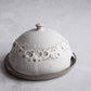 Handcrafted stoneware butter dish with crater glaze inspired by the moon