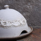 Handcrafted stoneware butter dish with crater glaze inspired by the moon.