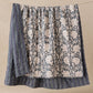 Ophelia hand-block printed linen quilt in indigo floral pattern on natural ground, US King size, draped to show full design, from WILLAGE