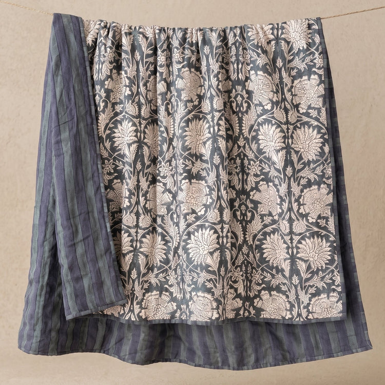 Ophelia hand-block printed linen quilt in indigo floral pattern on natural ground, US King size, draped to show full design, from WILLAGE